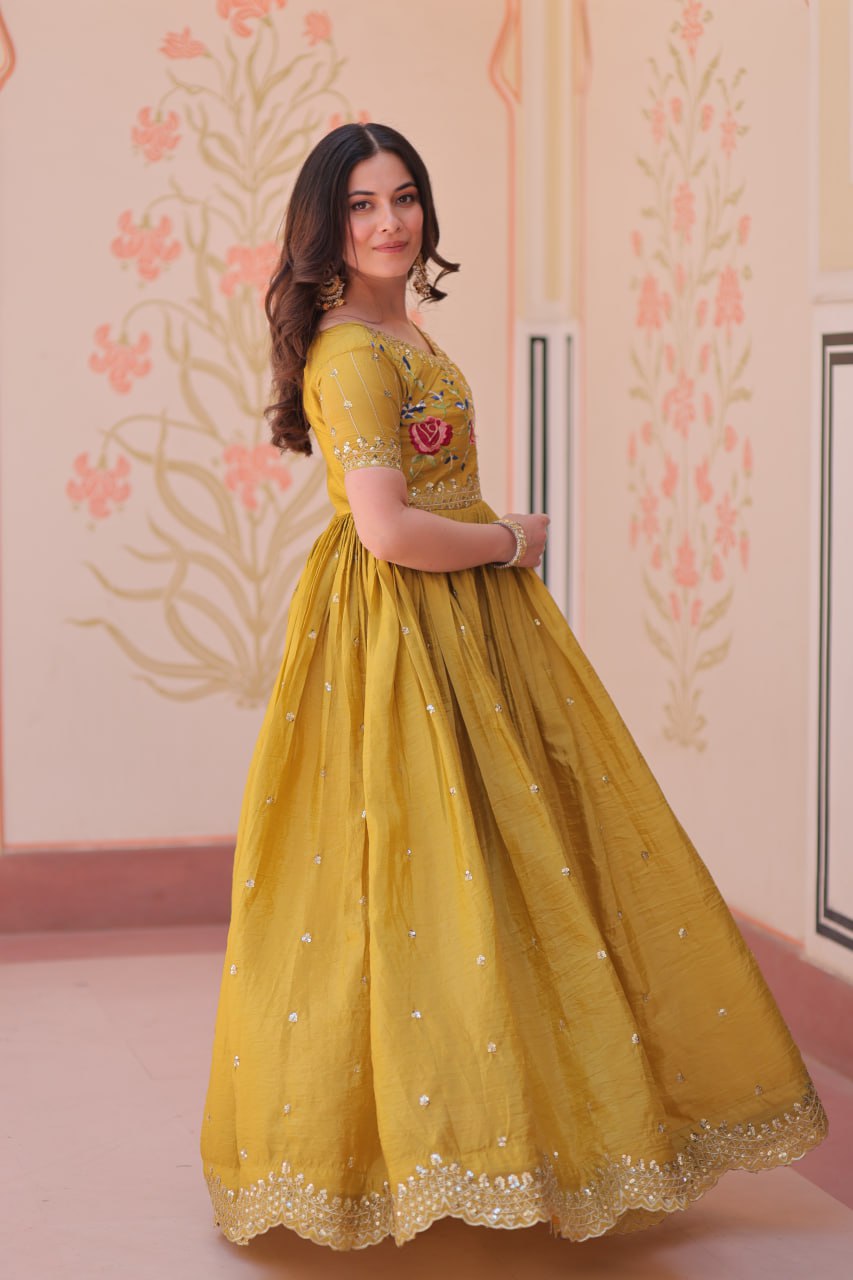 Mustard Yellow Gold Crush gown with zari, sequins, and multi-thread embroidery, featuring V-neck and short sleeves – perfect for weddings and festive occasions